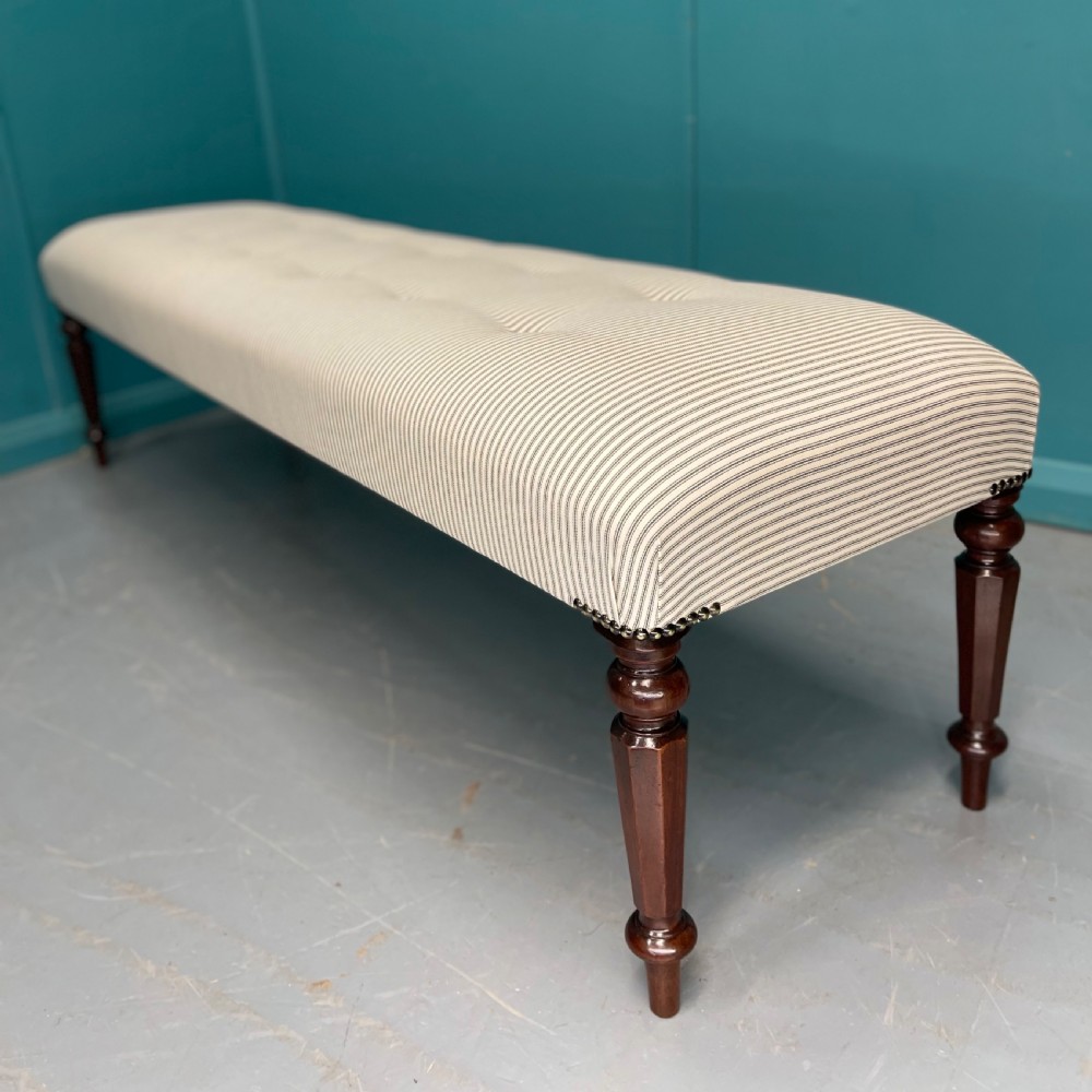 Newly upholstered 6 foot long stool in buttoned ticking View III