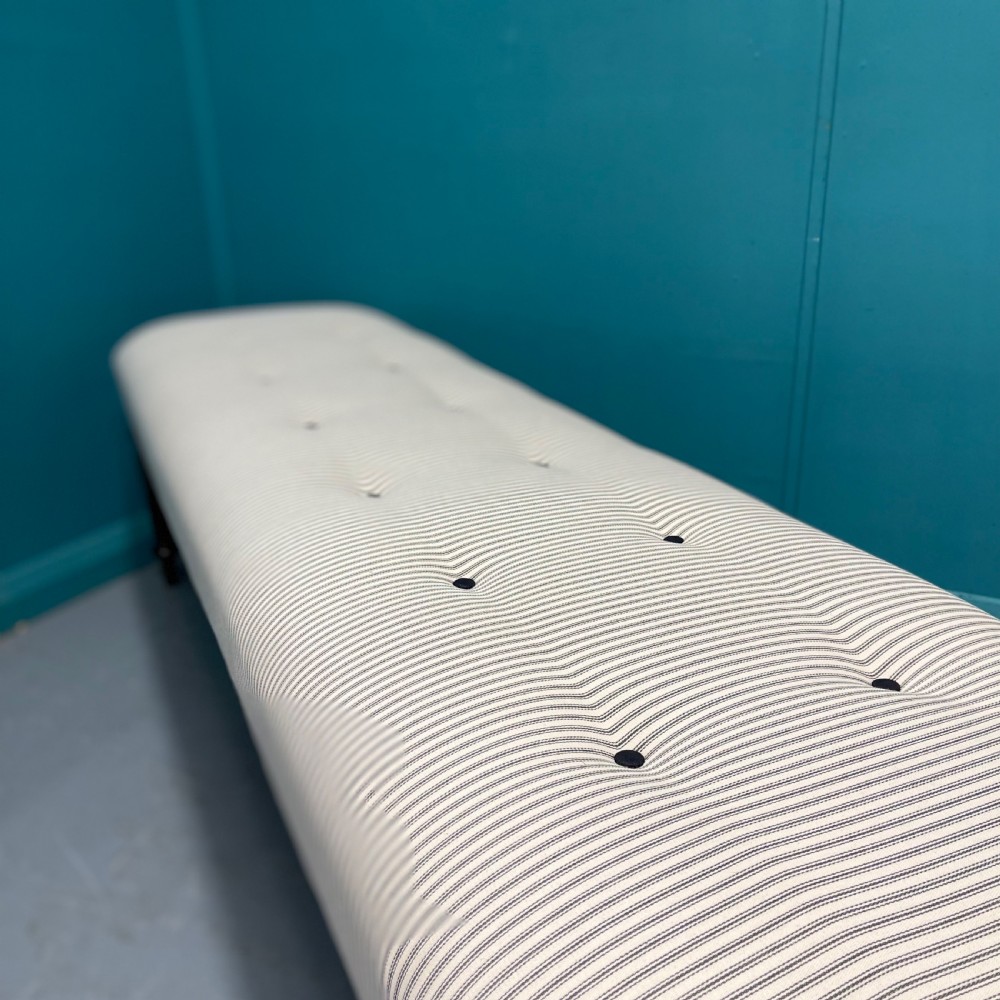 Newly upholstered 6 foot long stool in buttoned ticking View VI