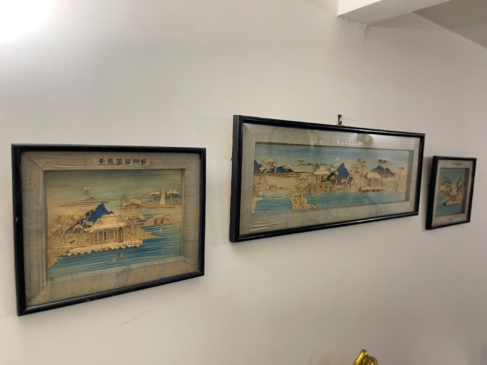 Triptych Chinese diorama of seascapes and pavilions 