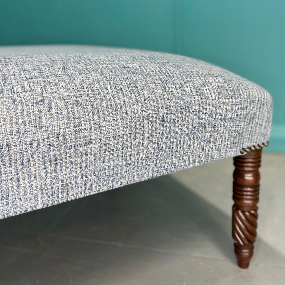 Large newly upholstered centre footstool  View V