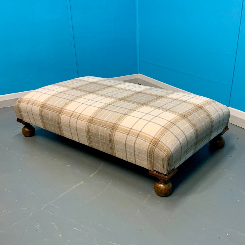 Newly upholstered low stool in Harris tartan plaid 