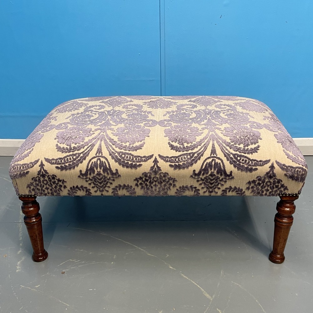 Footstool newly upholstered in mauve velvet pattern View IV