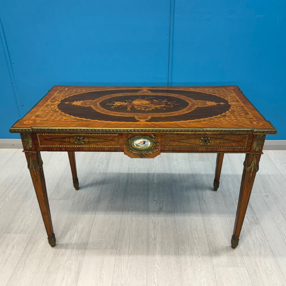 Kingwood marquetry centre table with brass