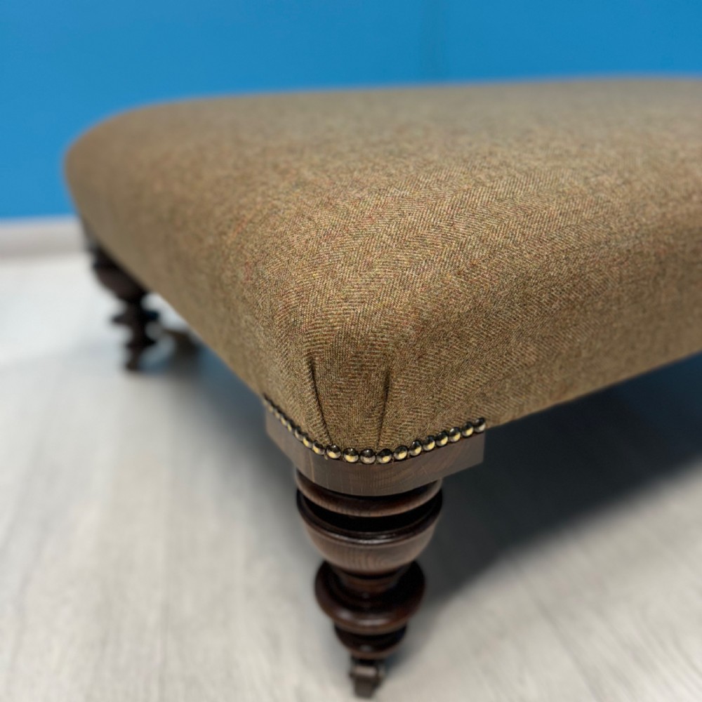 Large Harris Tweed footstool on castors View V