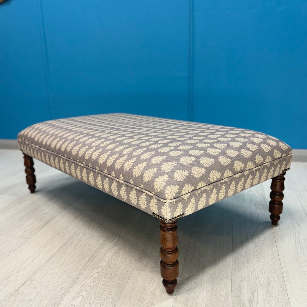 Newly upholstered Regency fern motif bordered stool