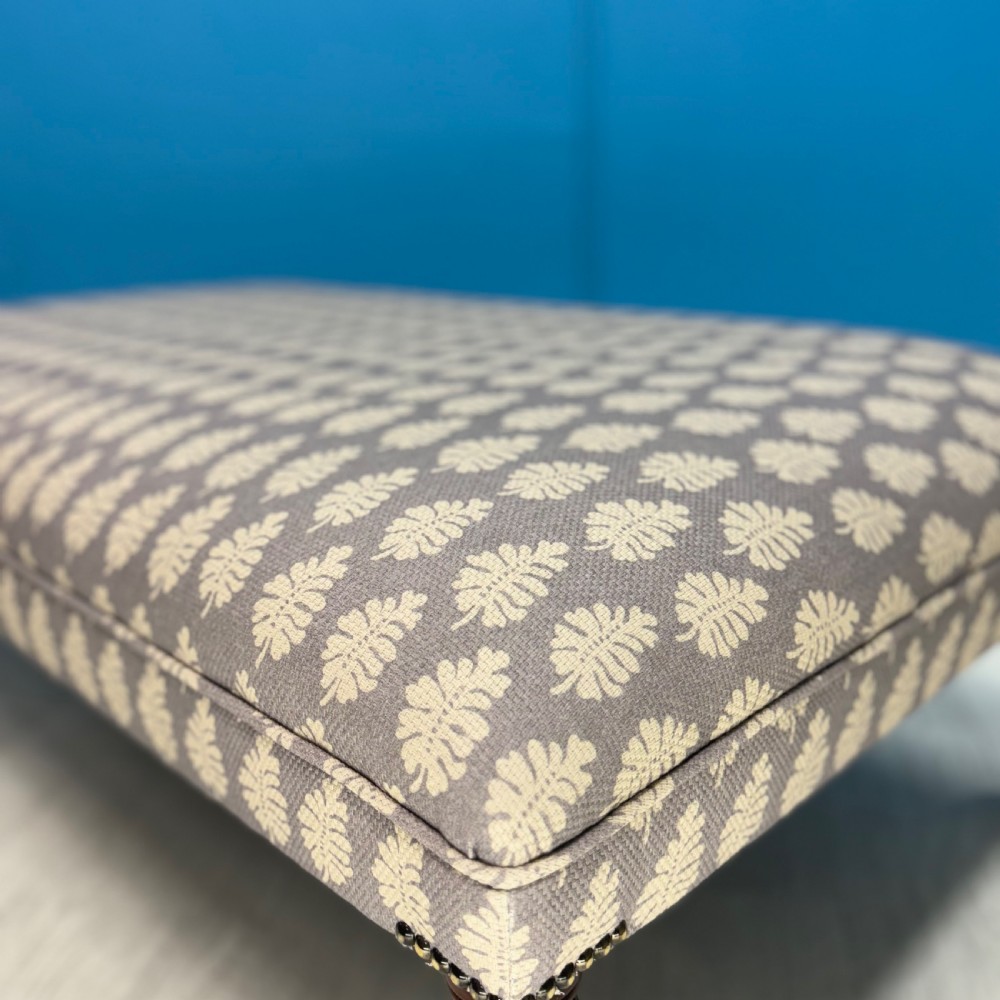 Newly upholstered Regency fern motif bordered stool View II