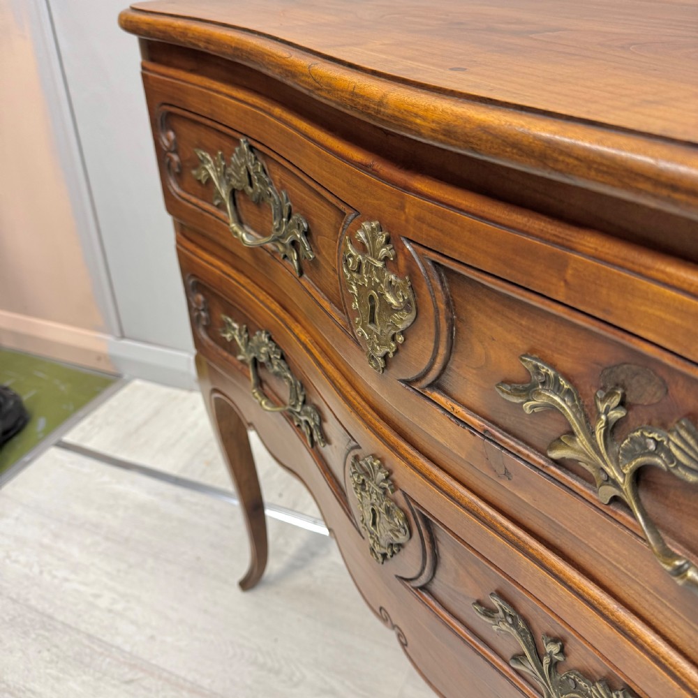 French serpentine chest of drawers in cherry wood View V