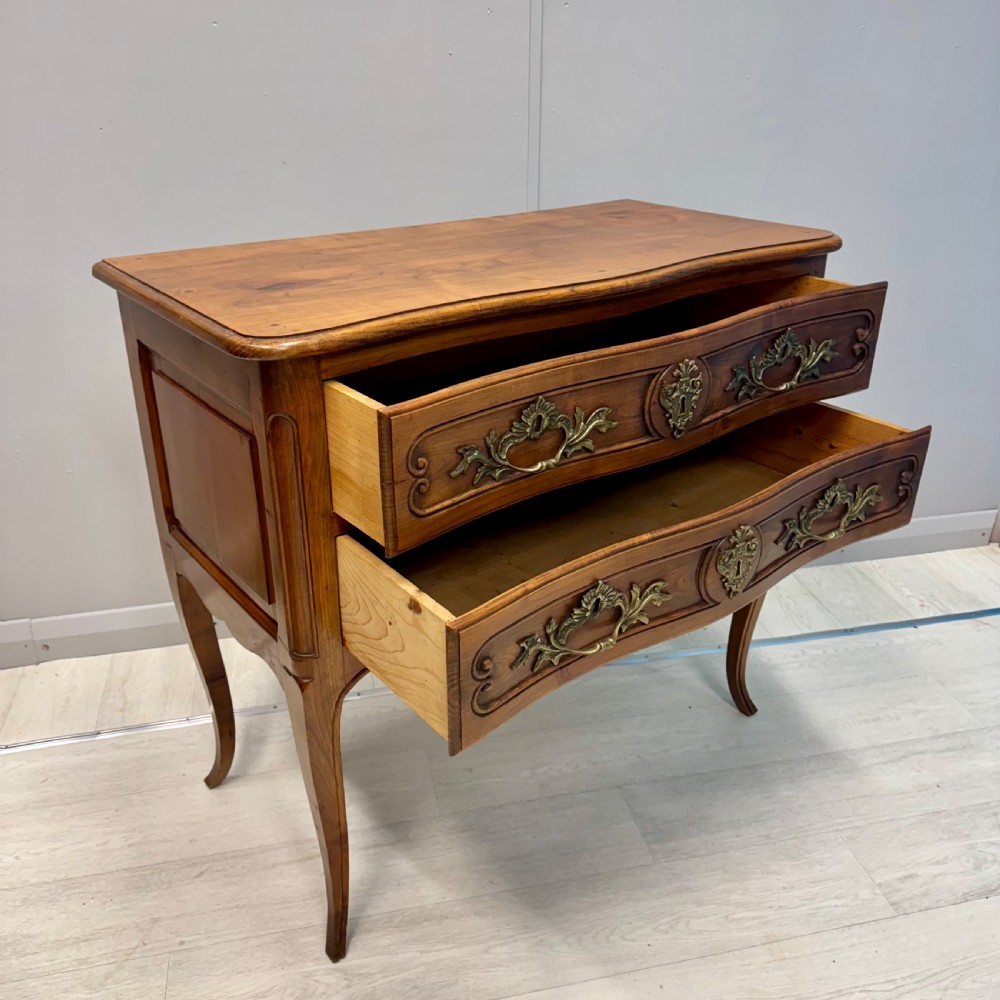 French serpentine chest of drawers in cherry wood View VI