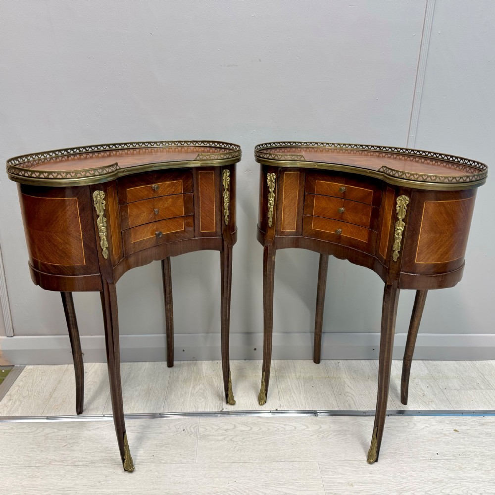 Pair of French kidney style side tables 