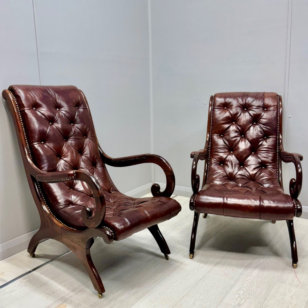 Near pair of Gillows “Spanish” leather armchairs View II