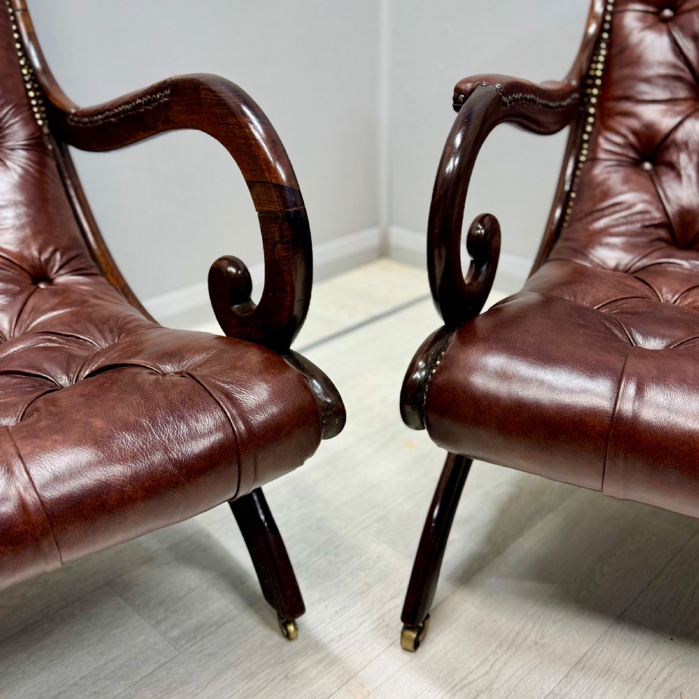 Near pair of Gillows “Spanish” leather armchairs View IV