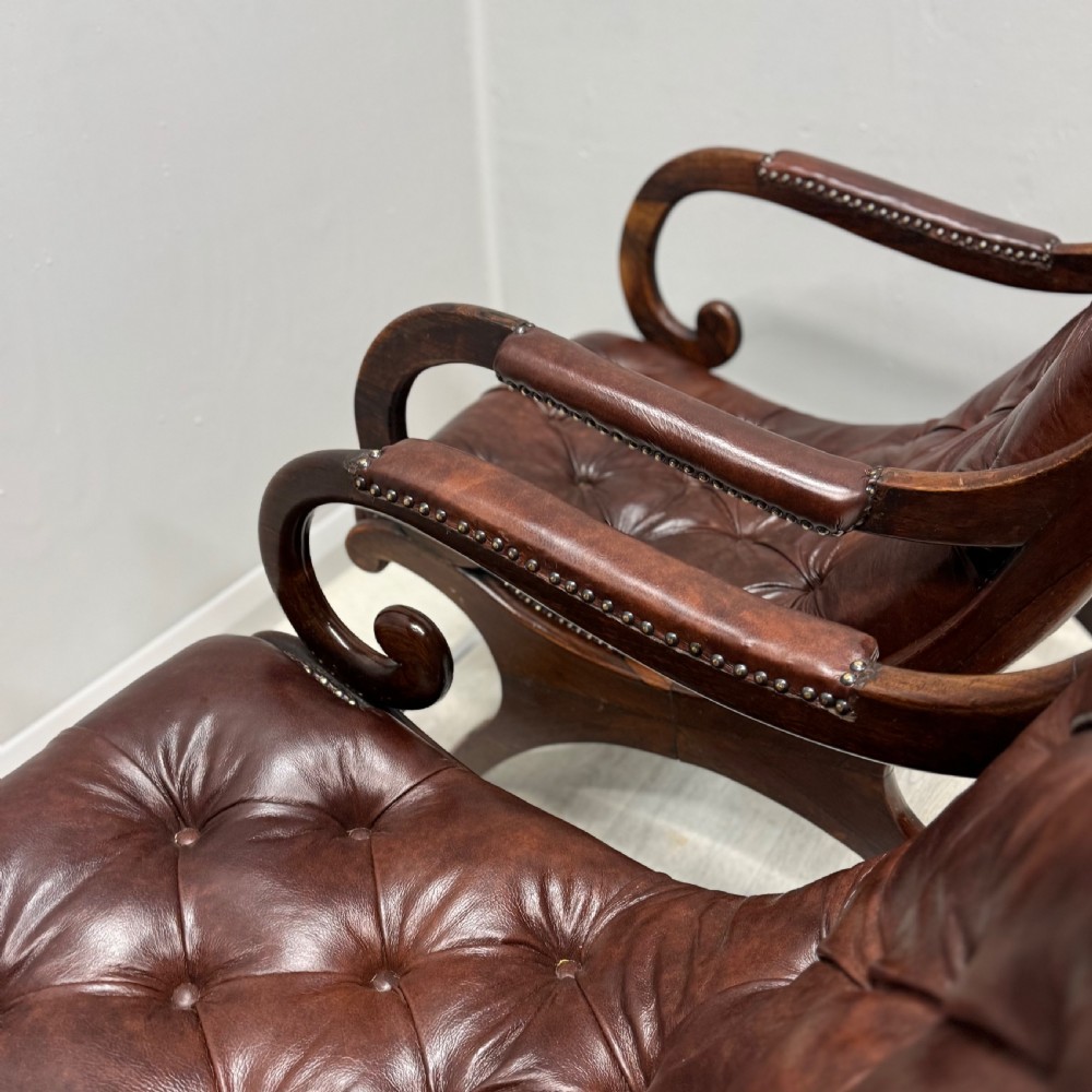 Near pair of Gillows “Spanish” leather armchairs View V