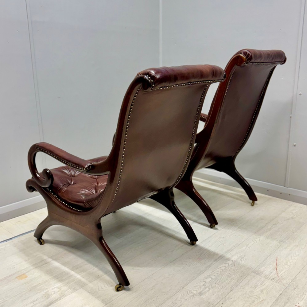 Near pair of Gillows “Spanish” leather armchairs View VI