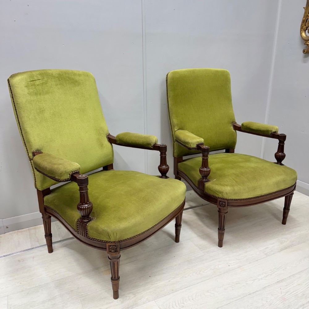 Pair of French open armchairs