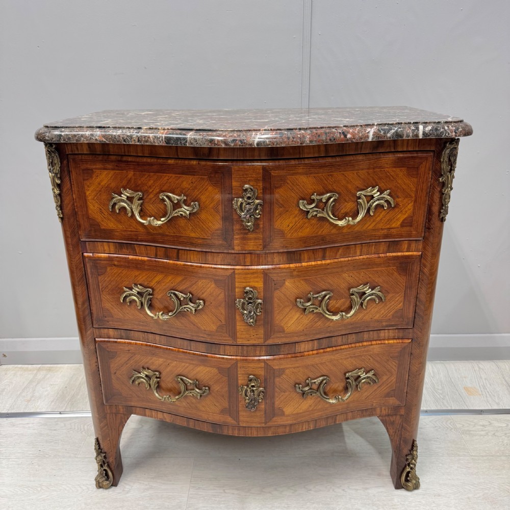 Small French inlaid serpentine commode with marble