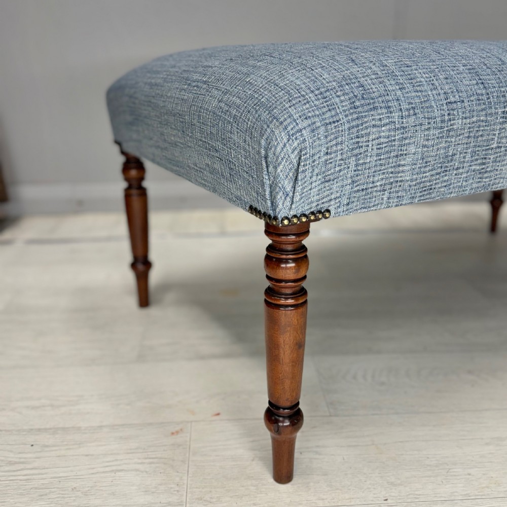 Newly upholstered turned leg footstool  View V