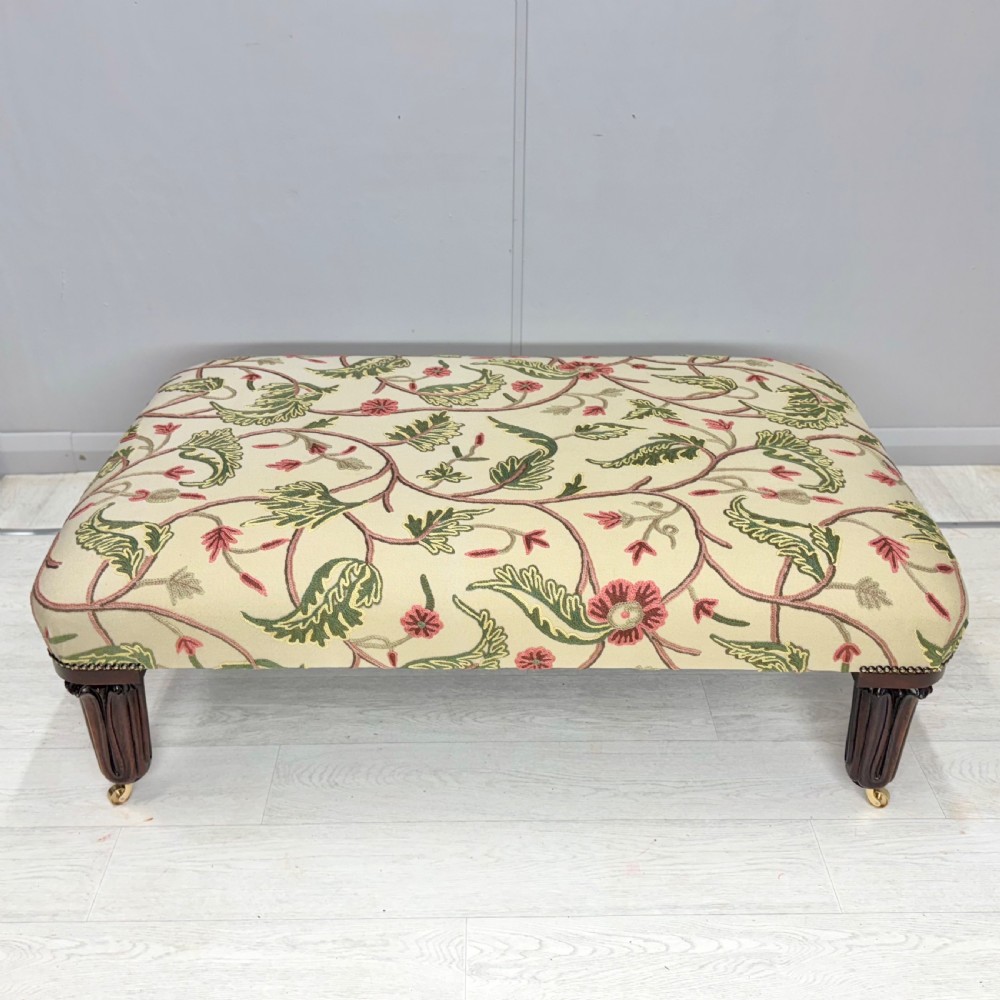 Large newly upholstered footstool on George IV legs View III