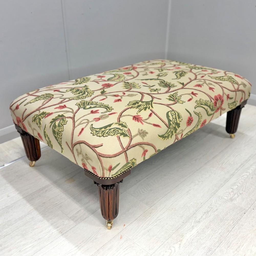 Large newly upholstered footstool on George IV legs View IV