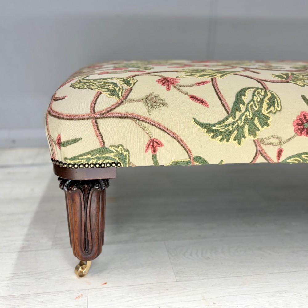 Large newly upholstered footstool on George IV legs View V