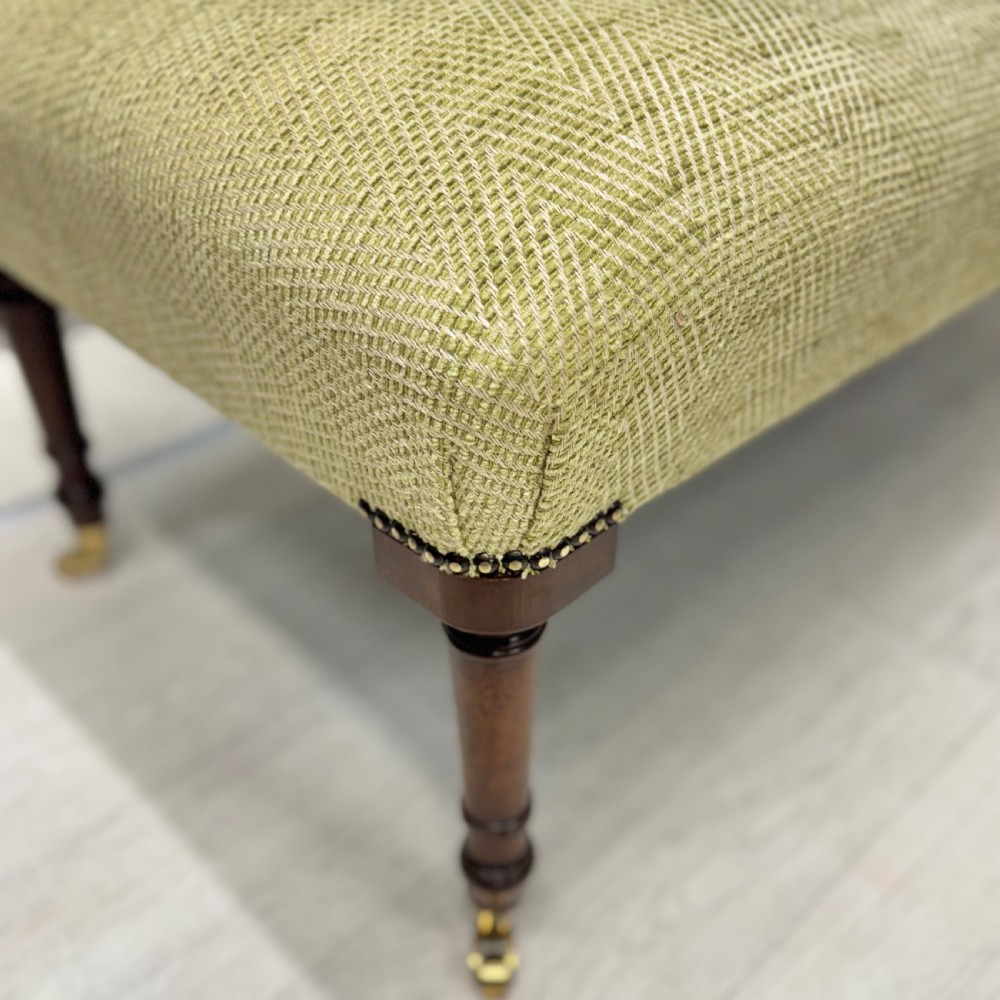 Newly upholstered footstool in Herringbone View II