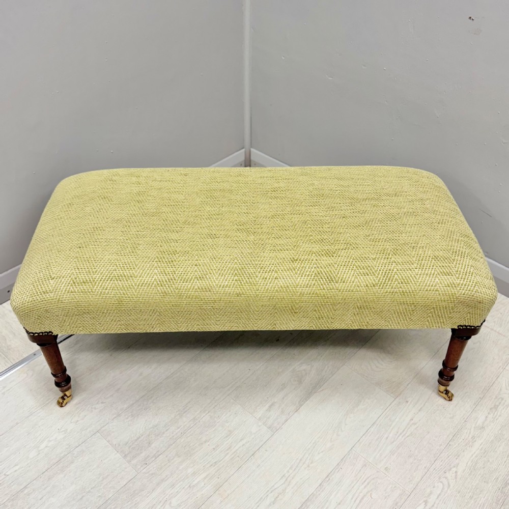 Newly upholstered footstool in Herringbone View VI