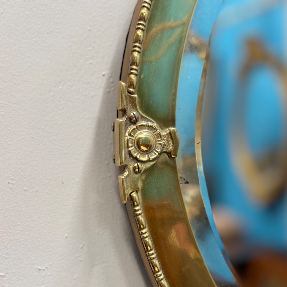 Edwardian brass oval mirror with bevelled glass View II