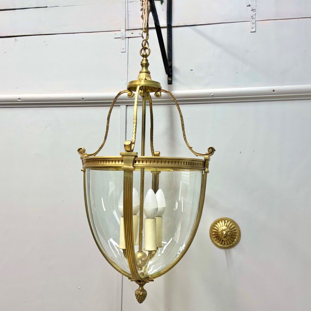 Hanging brass lantern with ceiling rose