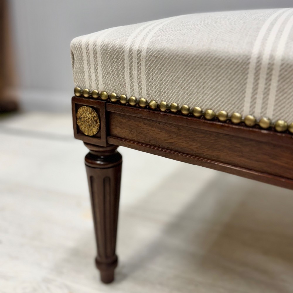 Newly upholstered French square footstool View II