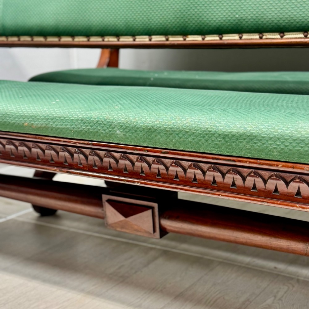 A pair of 19th-century carved mahogany benches featuring green upholstered seats and backrests supported by scrolled legs. View VIII