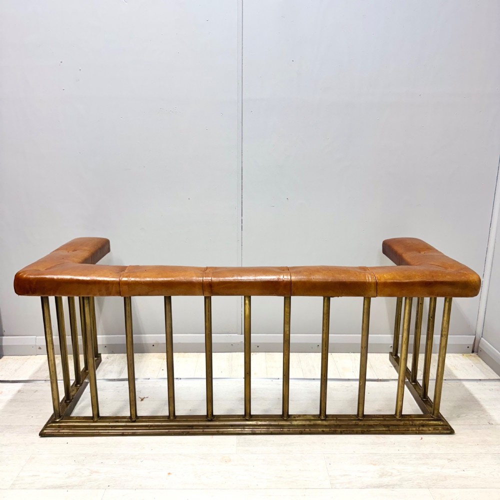 19th century brass club fender with leather seat