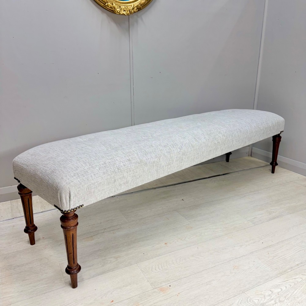 6 ft buttoned long stool on Regency legs