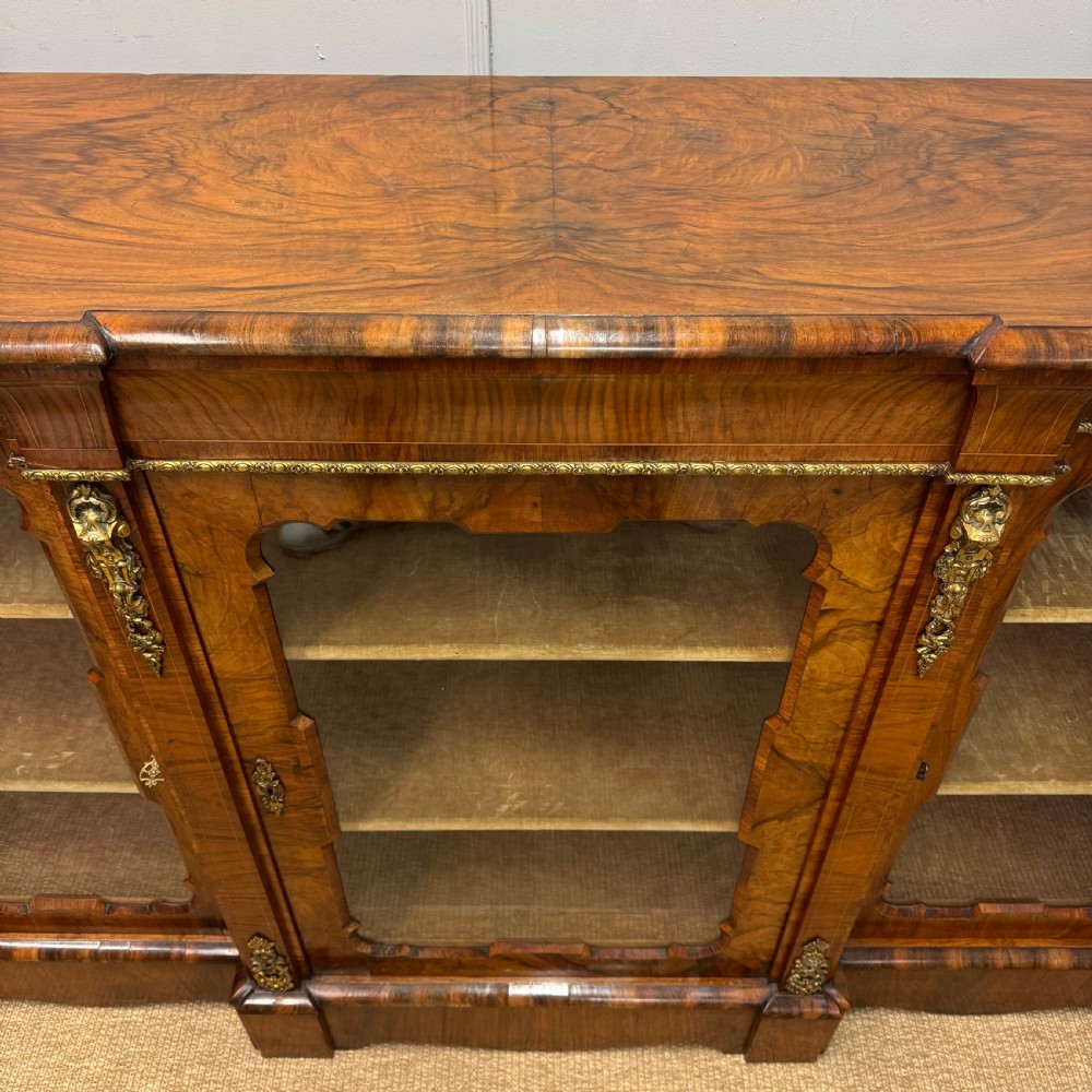 Breakfront bookcase in figured walnut View III