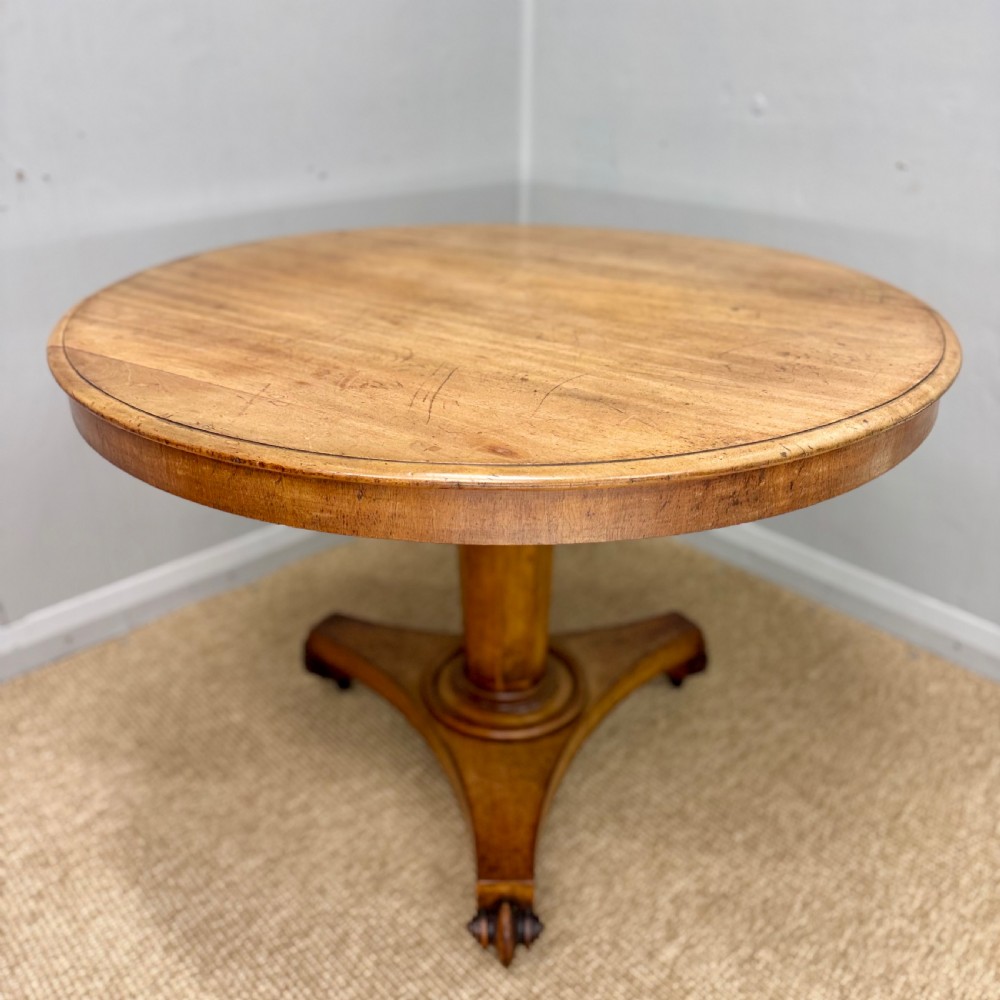 Bleached round mahogany tilt top centre table 