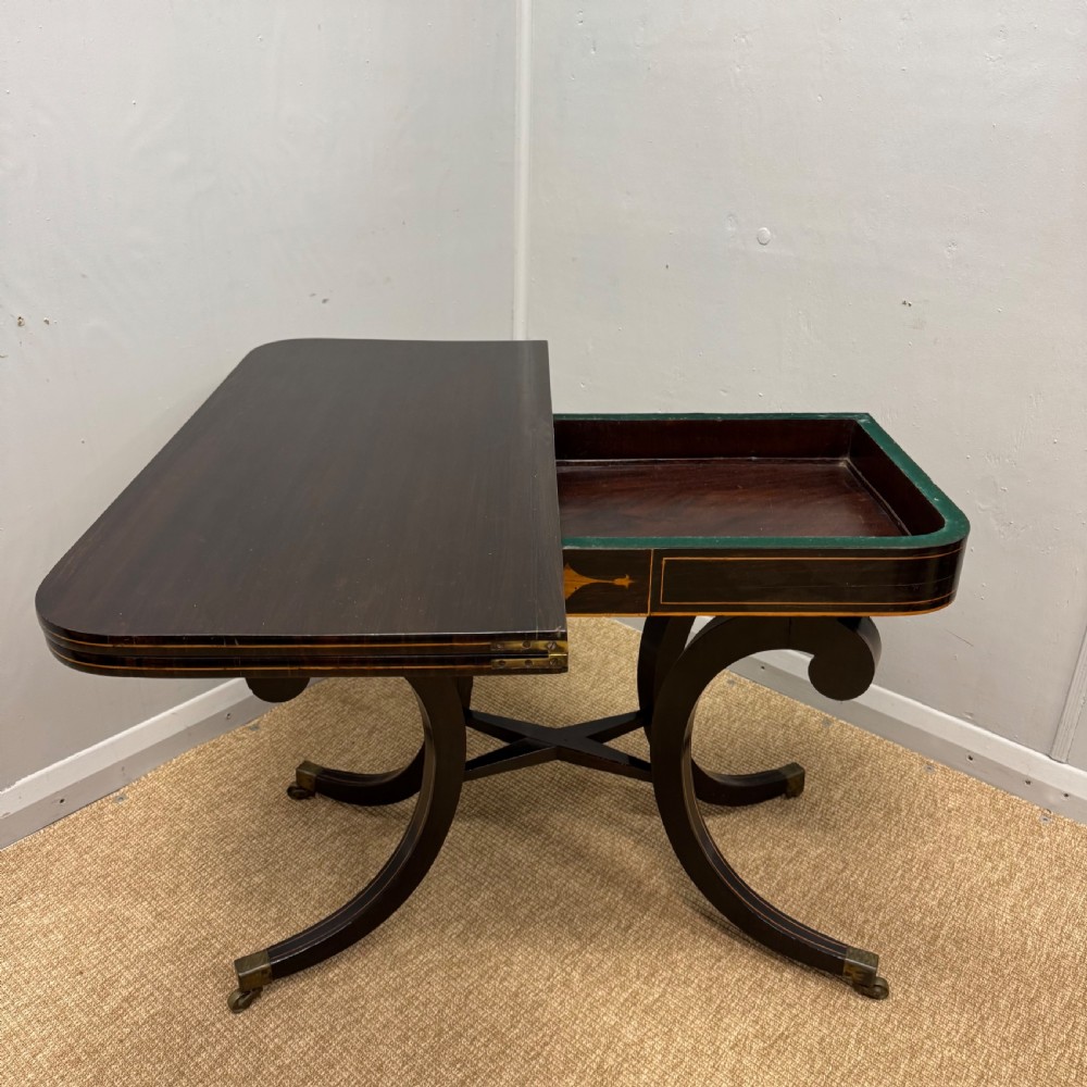 Regency ebonised fold over games table View VI