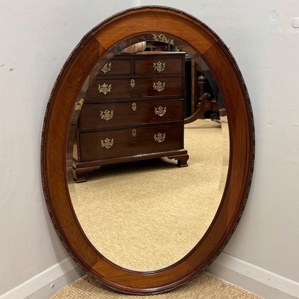Oval mahogany framed mirror with bevelled glass View II