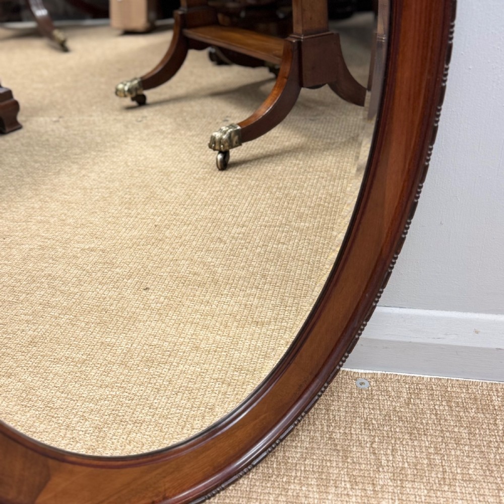 Oval mahogany framed mirror with bevelled glass View III
