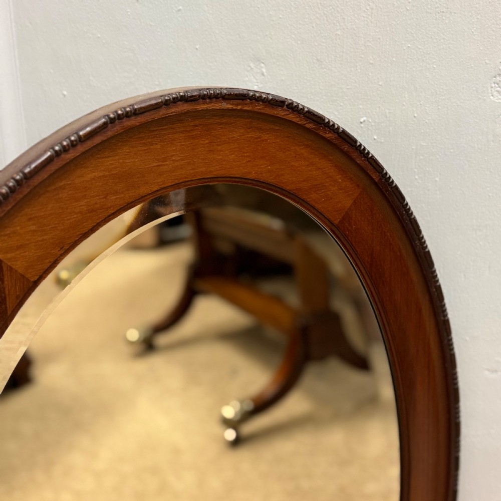 Oval mahogany framed mirror with bevelled glass View IV