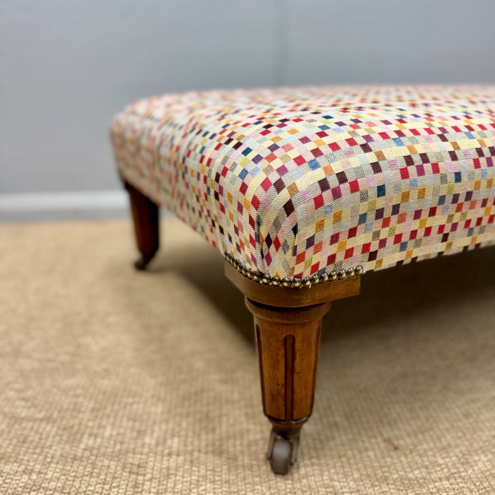 Large geometric footstool on castors View III