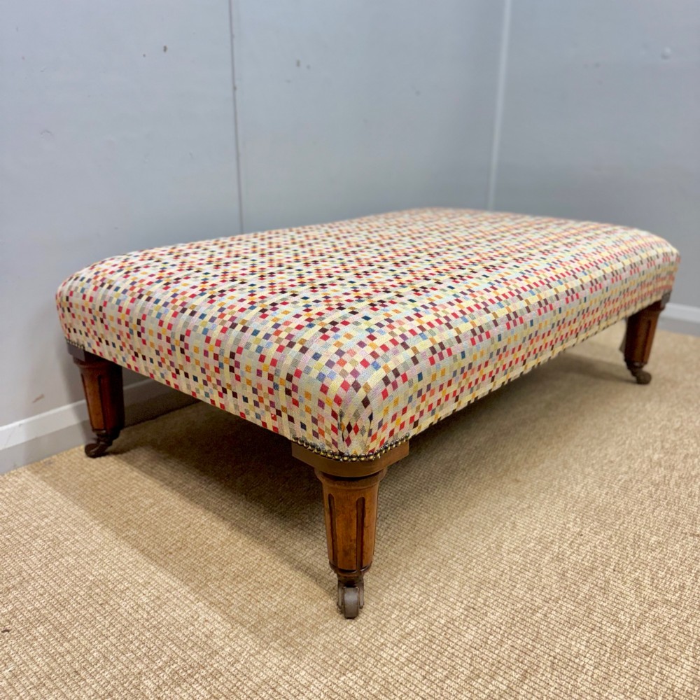 Large geometric footstool on castors View VI