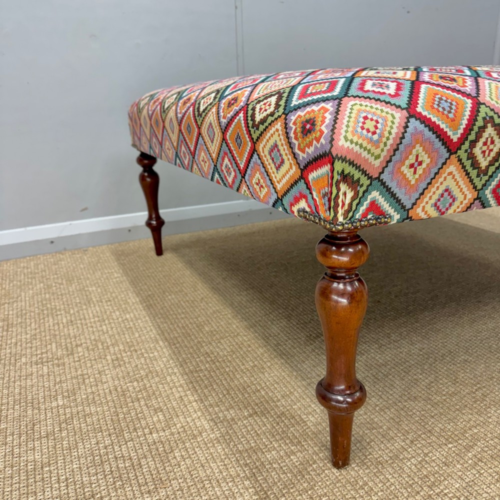 Newly upholstered 100cm square geometric pattern footstool View III