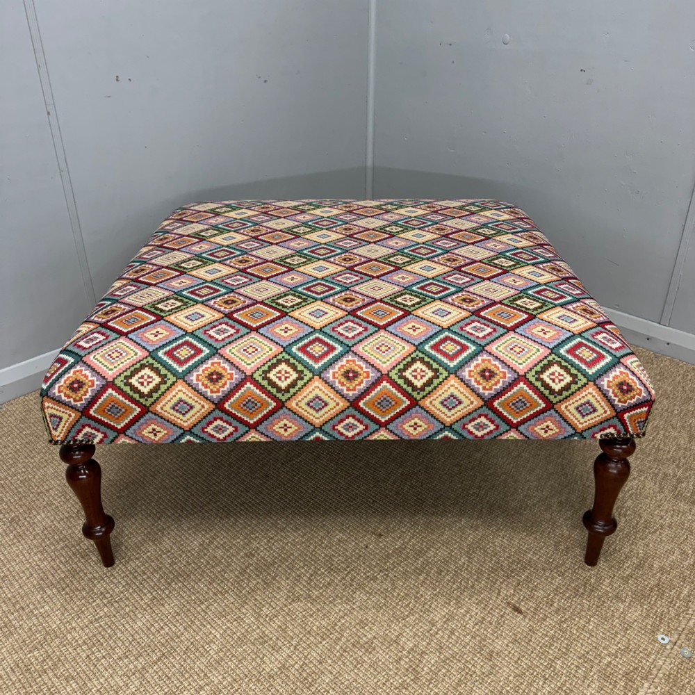Newly upholstered 100cm square geometric pattern footstool View VI