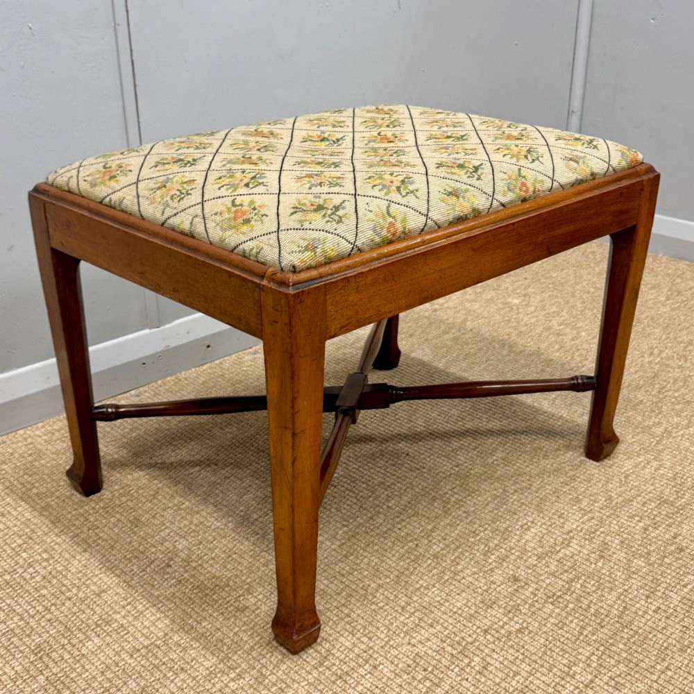 Large dressing table stool with cross stretcher