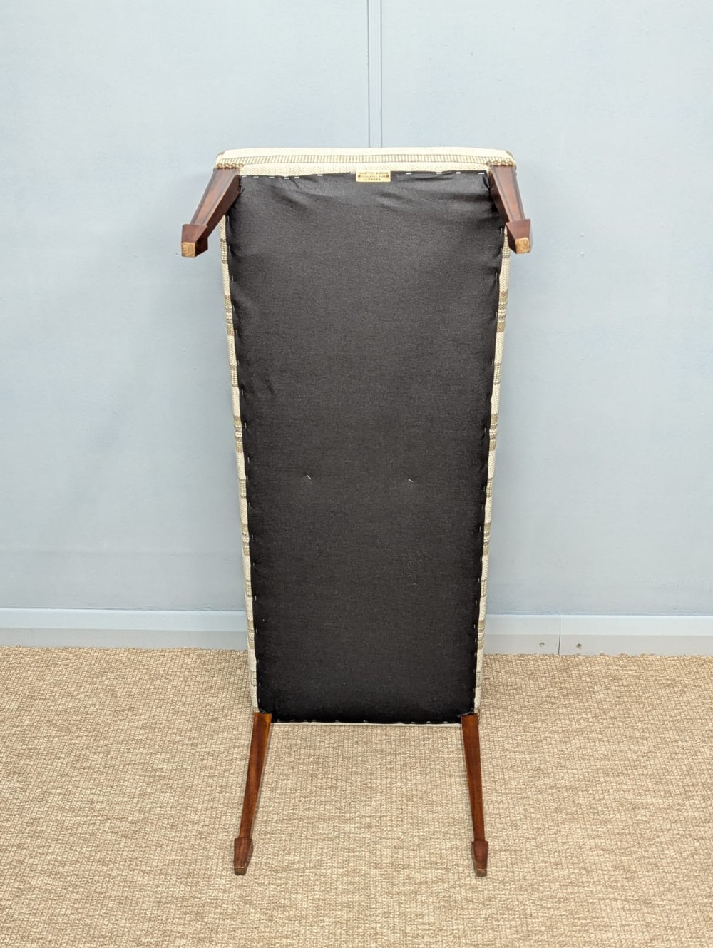 An Edwardian rectangular satinwood piano stool upholstered in beige striped fabric with square tapered legs. View VII