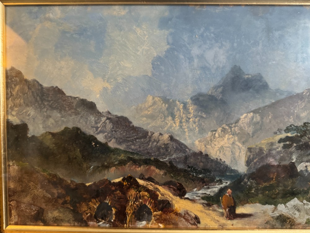 A 19th-century oil painting depicting a rocky mountain landscape with a winding stream and figures, enclosed in a gilded wooden frame. View III