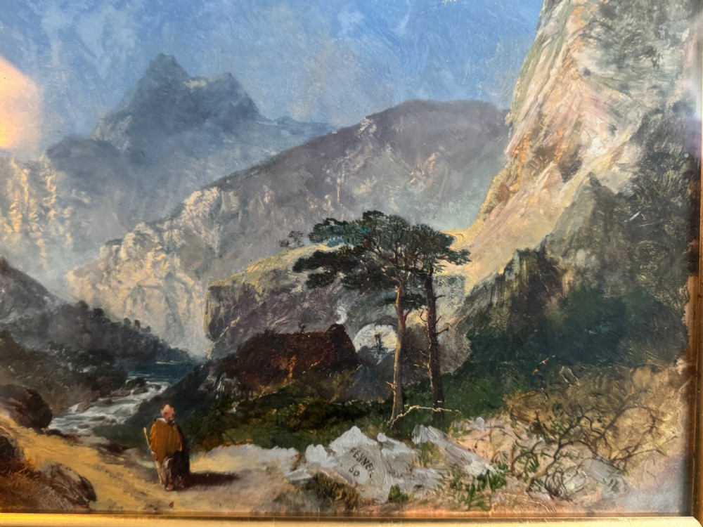 A 19th-century oil painting depicting a rocky mountain landscape with a winding stream and figures, enclosed in a gilded wooden frame. View V
