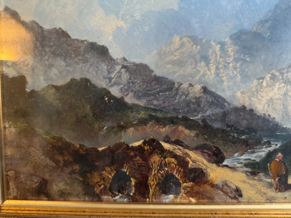A 19th-century oil painting depicting a rocky mountain landscape with a winding stream and figures, enclosed in a gilded wooden frame. View VI