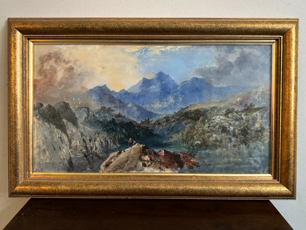 A 19th-century oil painting depicting a rocky mountain landscape with a winding stream and figures, enclosed in a gilded wooden frame. View IX