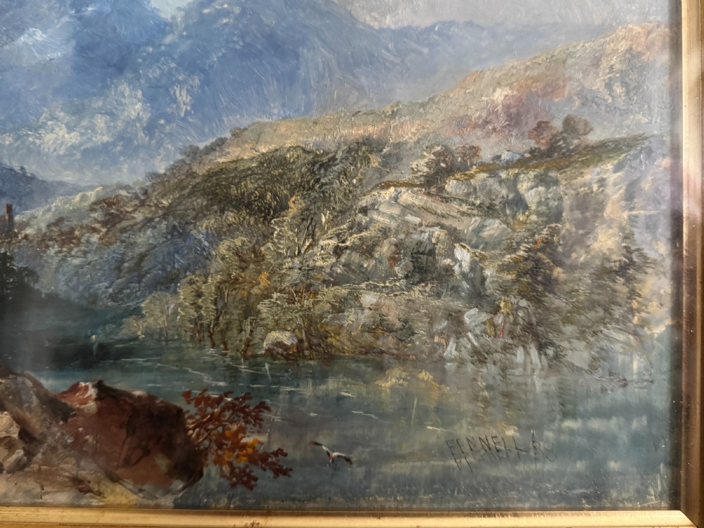 A 19th-century oil painting depicting a rocky mountain landscape with a winding stream and figures, enclosed in a gilded wooden frame. View XIII