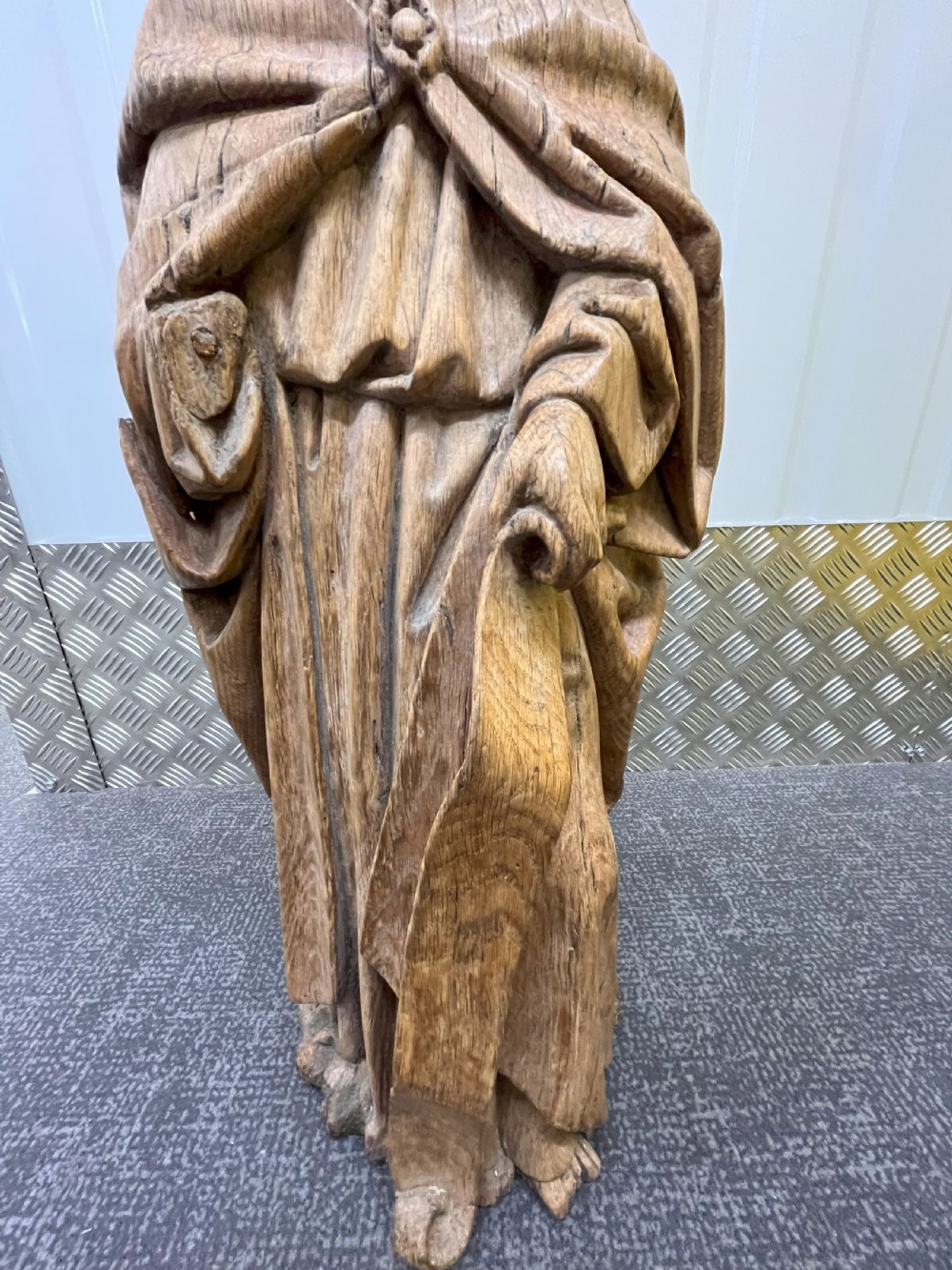 A pair of hand-carved oak sculptures depicting two standing saints in long draped robes. View VII