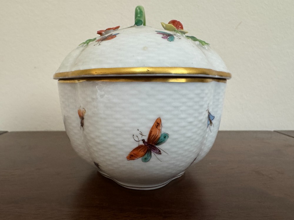 A white Dresden porcelain lidded bowl featuring relief basketweave moulding, hand-painted birds and insects, a branch handle, and gilt borders. View VIII